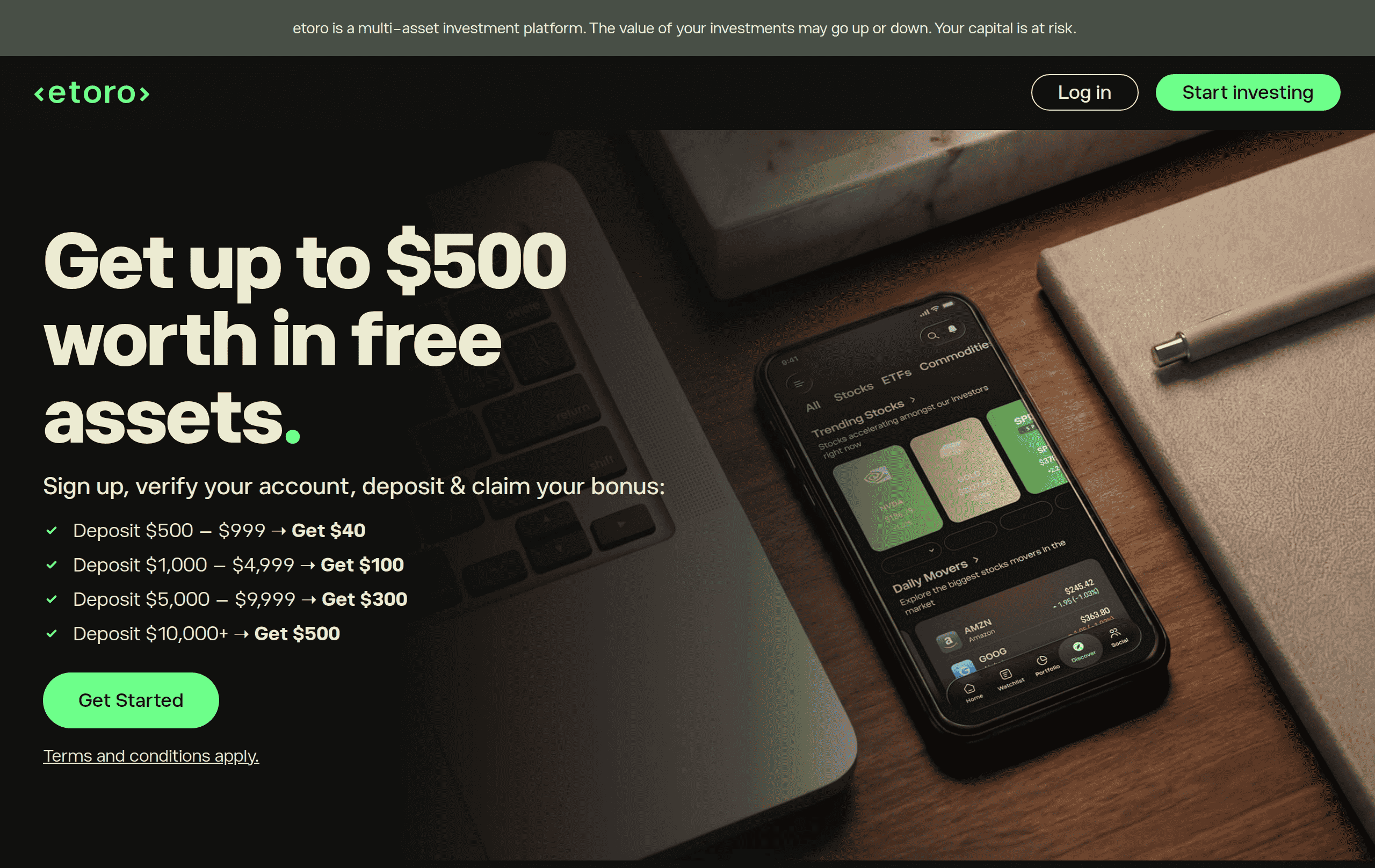 eToro welcome bonus landing page reading Get up to $500 worth in free assets, with deposit tiers from $500 for $40 up to $10,000 plus for $500, next to a phone showing the eToro app